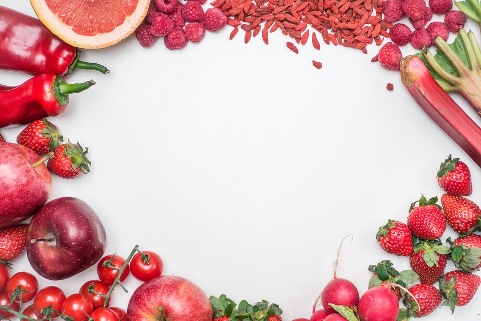 Flat Lay of Fresh Red Toned Vegetables and Fruits