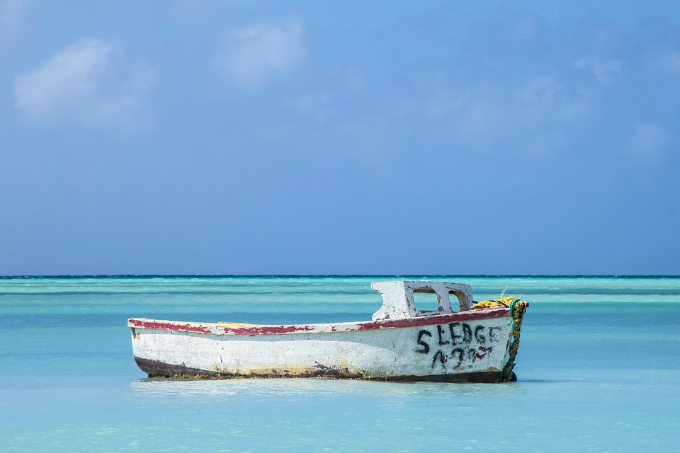 Turquoise Sea and Old Boat