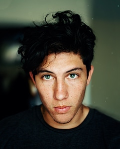 Young Man with Green Eyes and Freckles photo