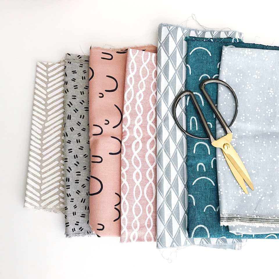 Pieces of Colored Fabric with Scissors