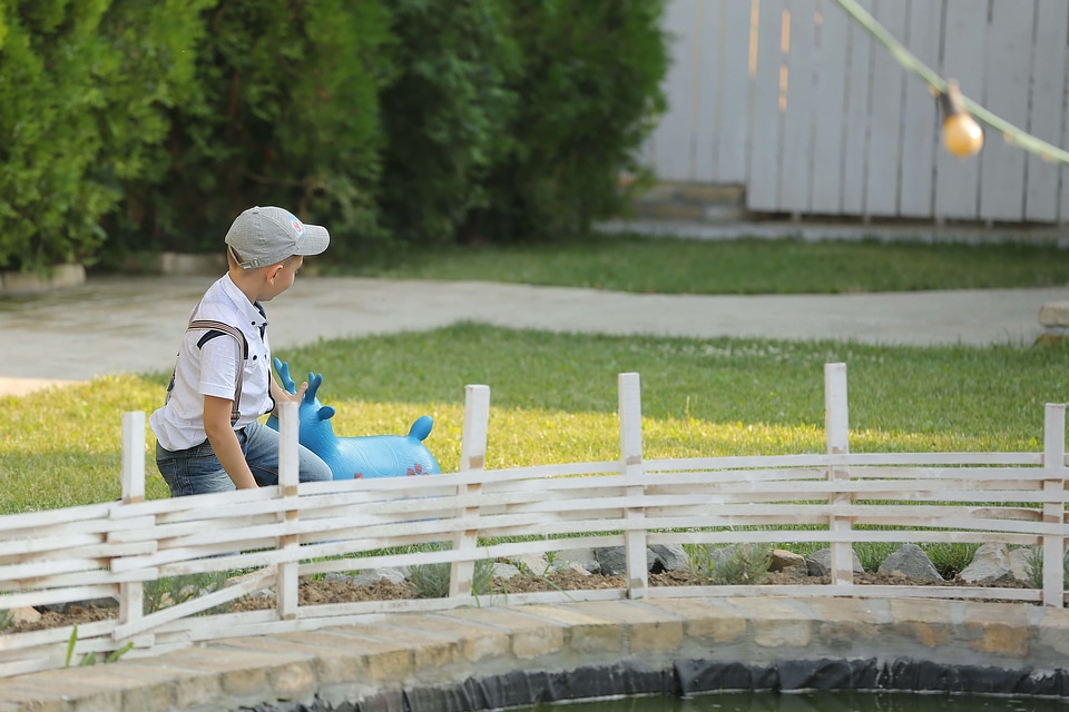 Picket Fence boy playful