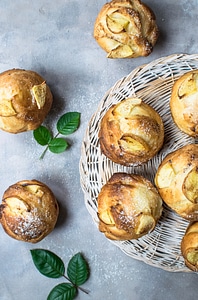 Sweet Composition of Yeast Muffins with Apple photo