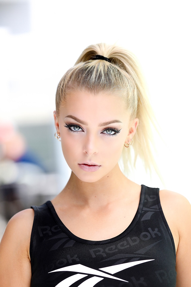 Blonde Model Posing in Sport Top