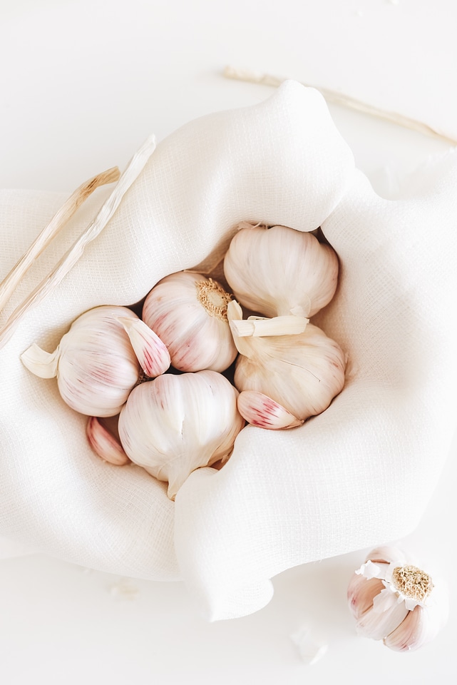 Garlic Cloves and Bulbs in a White Cloth