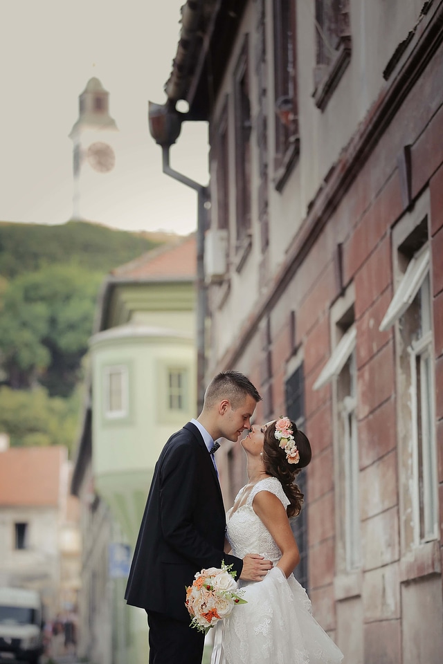 Kiss groom bride