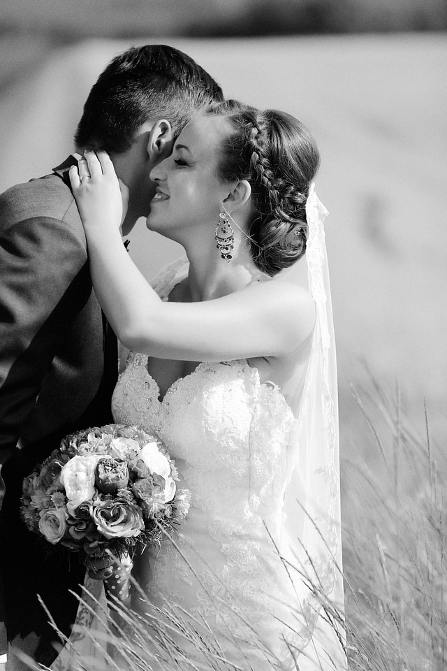 Bride smile hugging