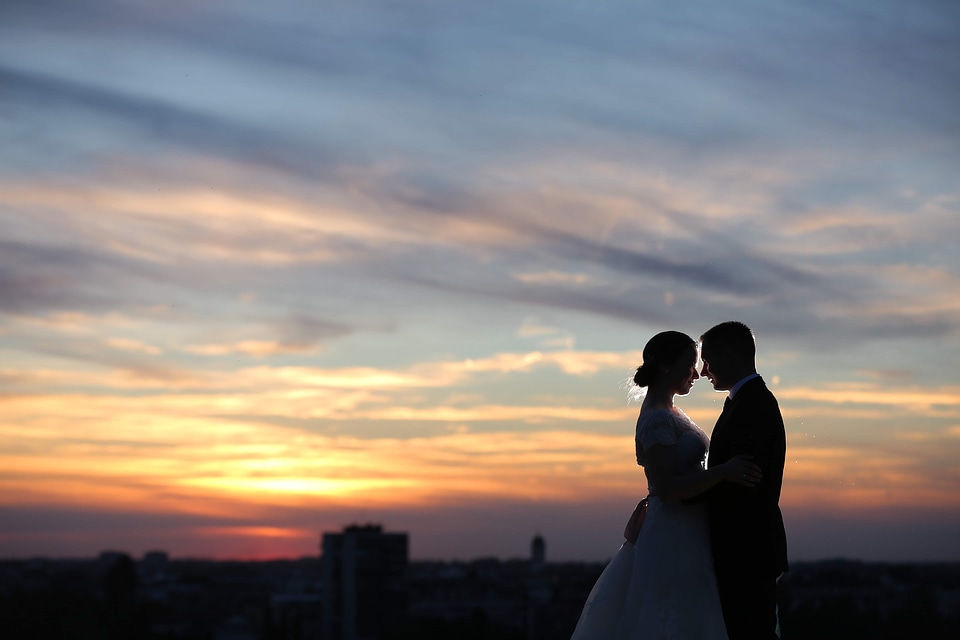 Bride sunset groom