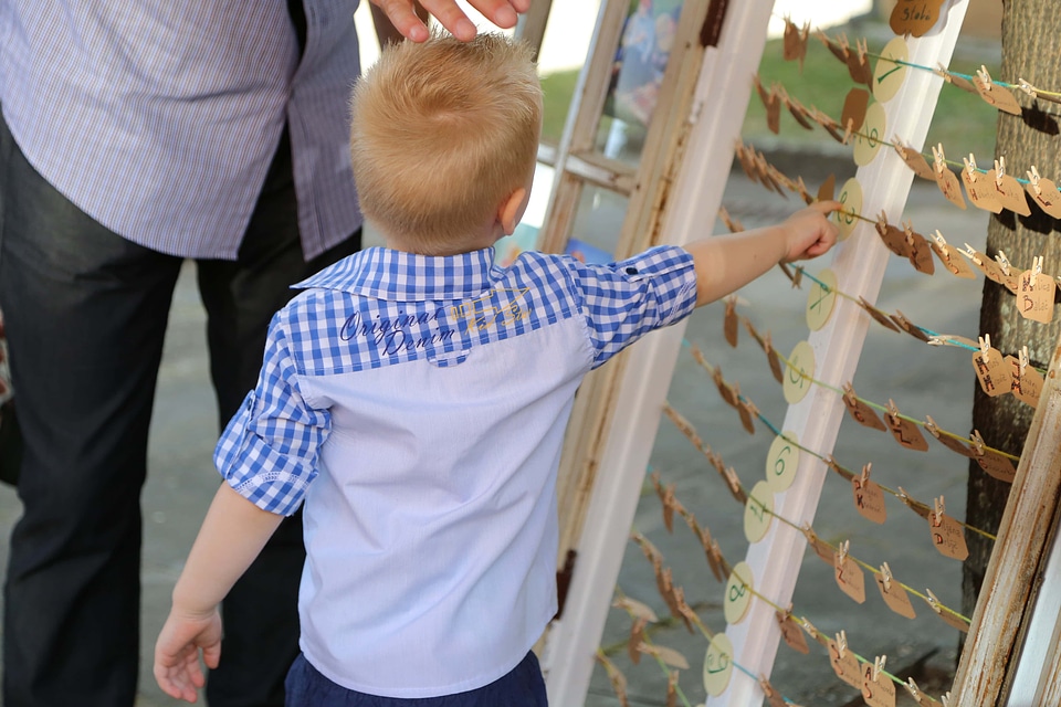 Boy blonde hair playful