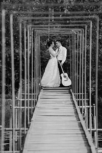 Groom bride guitarist photo