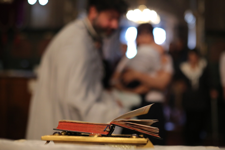Baptism christianity priest