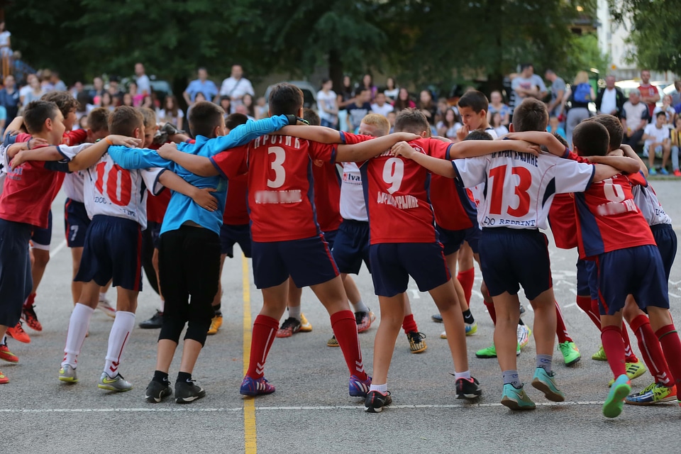 Team hugging dance