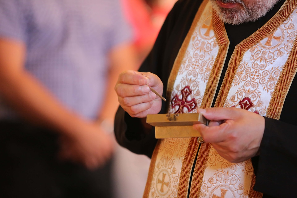 Priest baptism religion