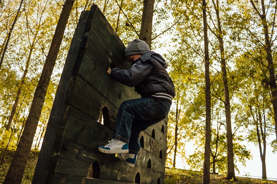 Boy playground climbing
