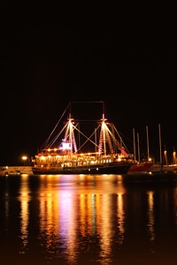 Night cruise ship sailboat