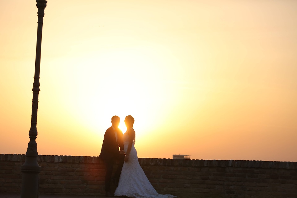 Backlight bride husband