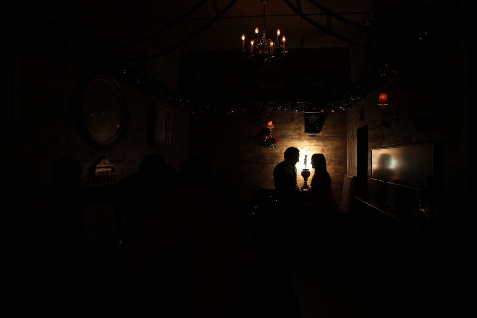 Boyfriend chandelier dinner