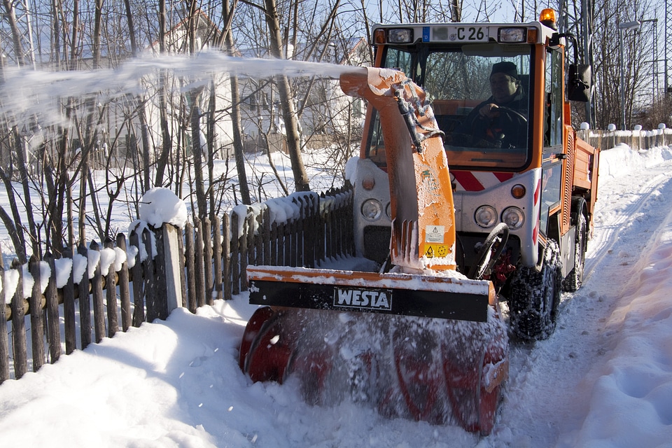 Winter service screw conveyor blower