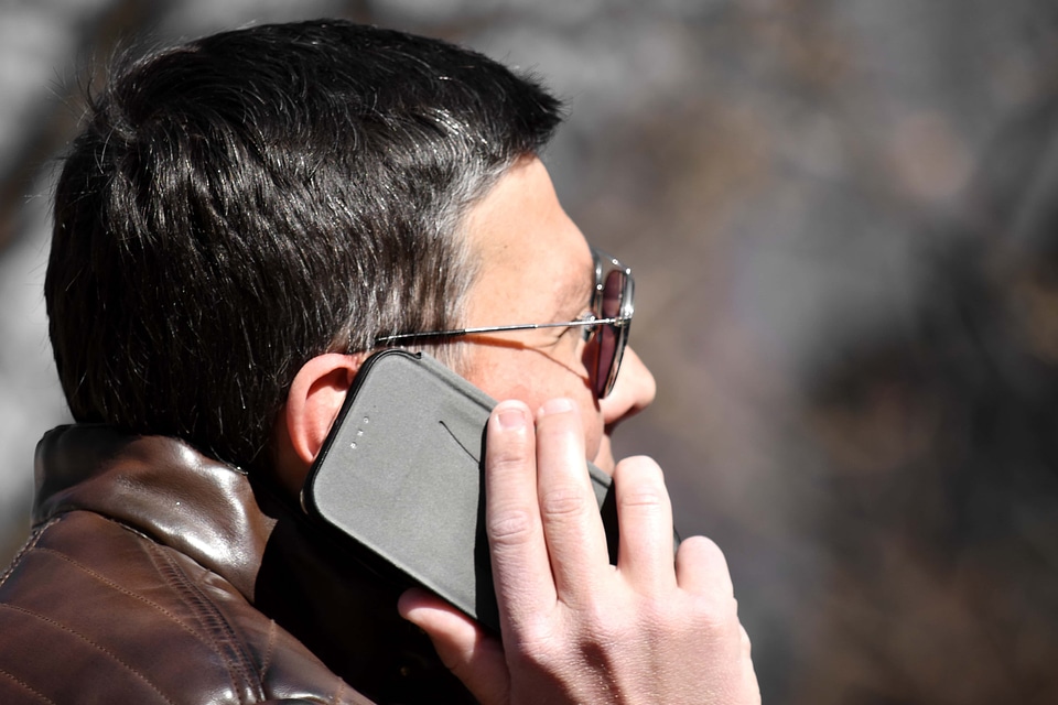 Businessman businessperson ear