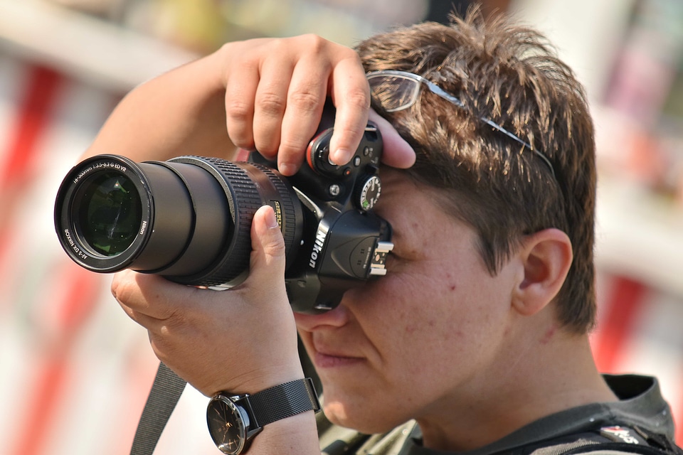 Lens camera photographer
