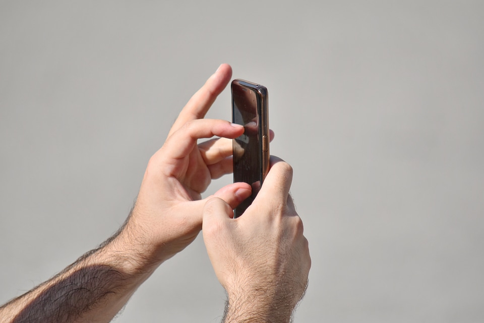 Mobile Phone touch hand