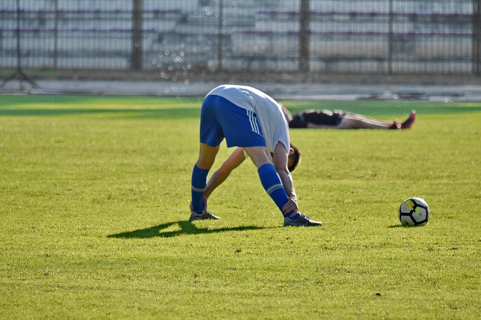 Football Player grass injury