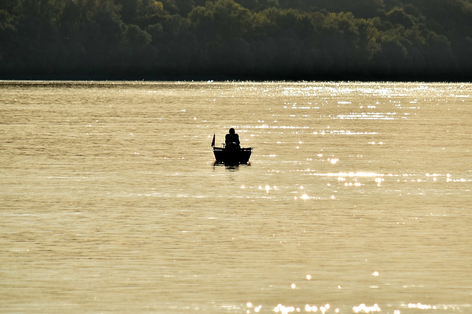 Boat distance fisherman