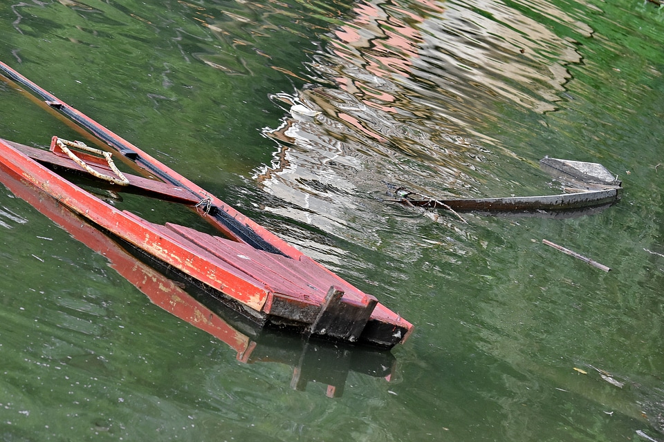 Boats flood reflection