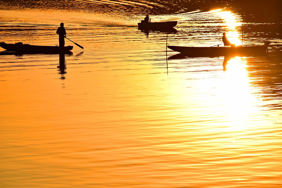 Boats fisherman shadow