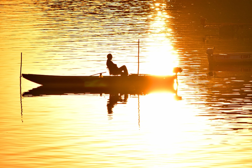 Fisherman orange yellow silhouette