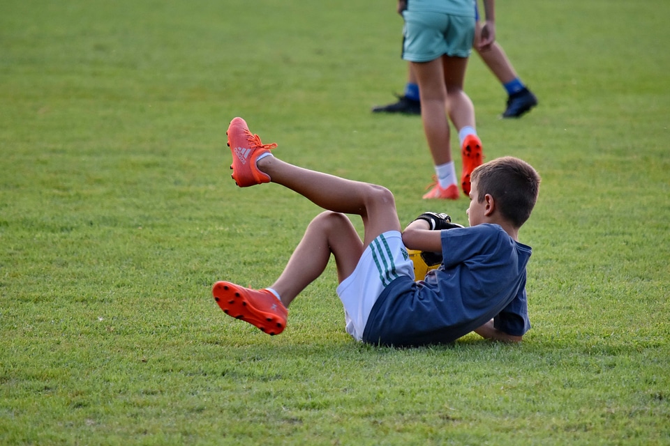 Child defensive football player