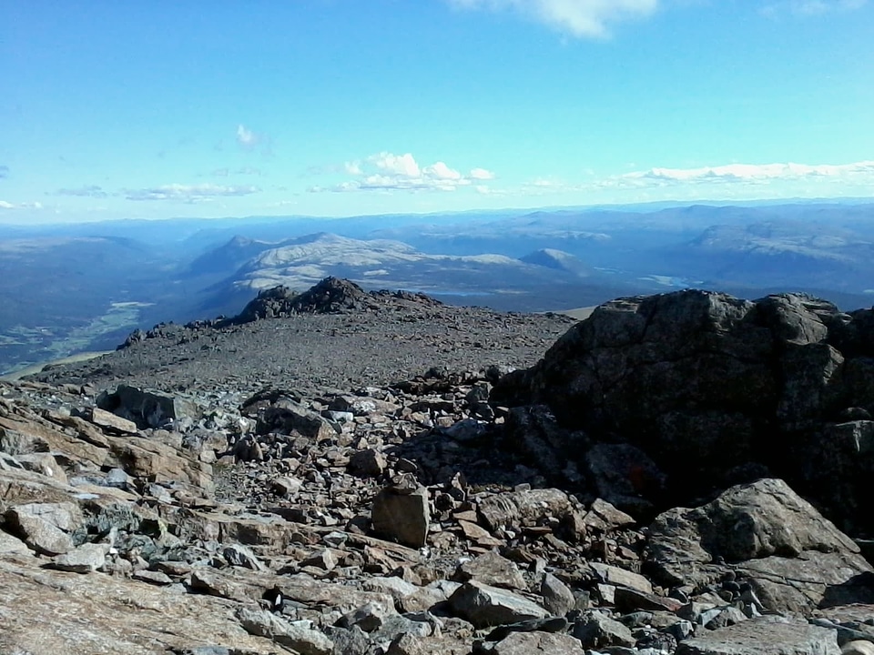 Clouds mountain peak mountainside photo