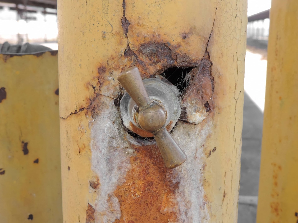 Abandoned brass faucet