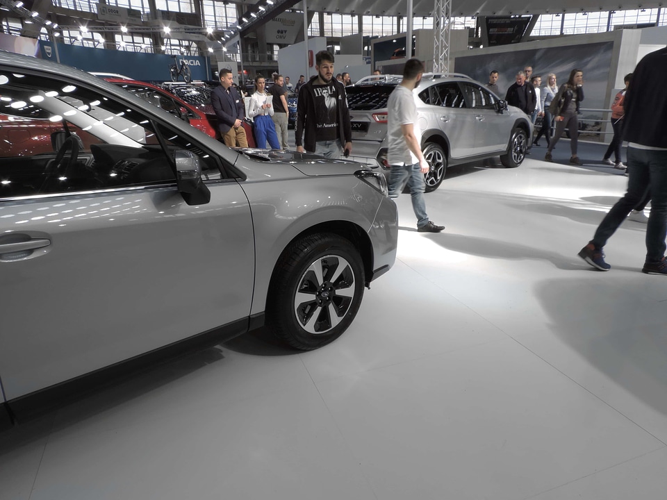 Cars exhibition people