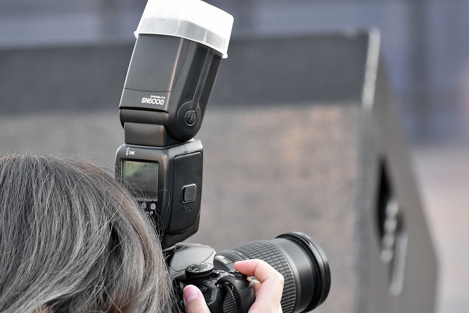 Photographer woman lens