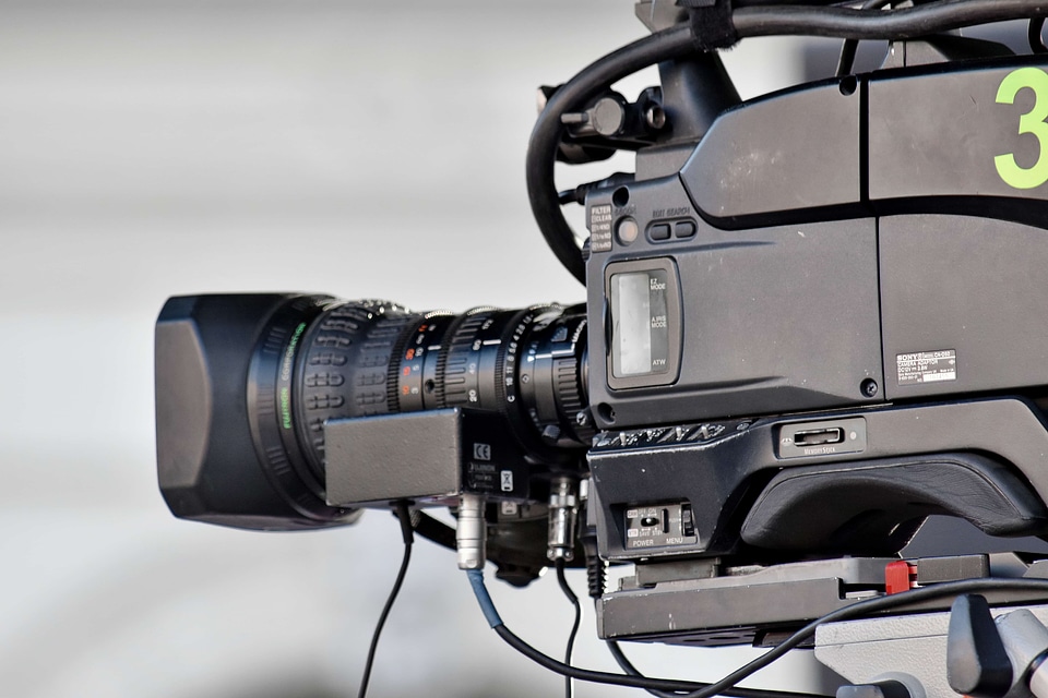 Telecommunication television news tripod