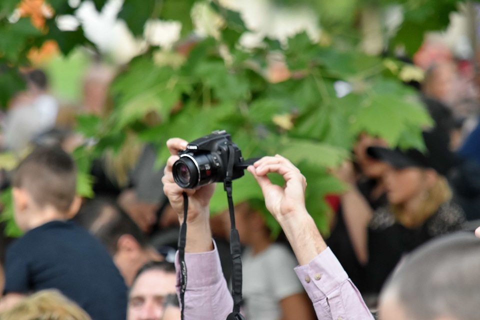 Crowd paparazzi photographer