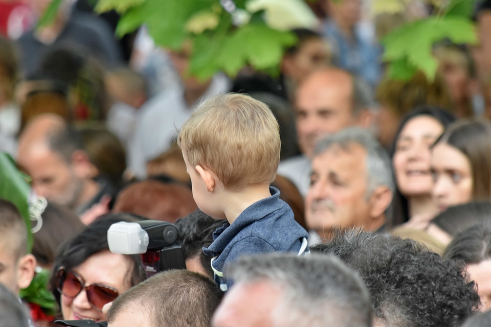 Child crowd curiosity