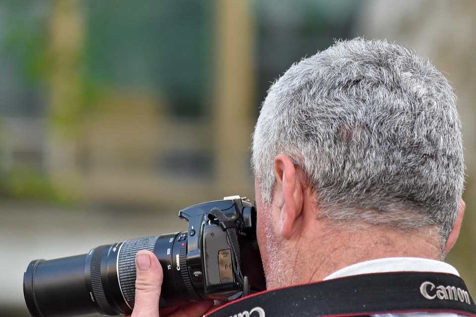 Paparazzi photojournalist portrait