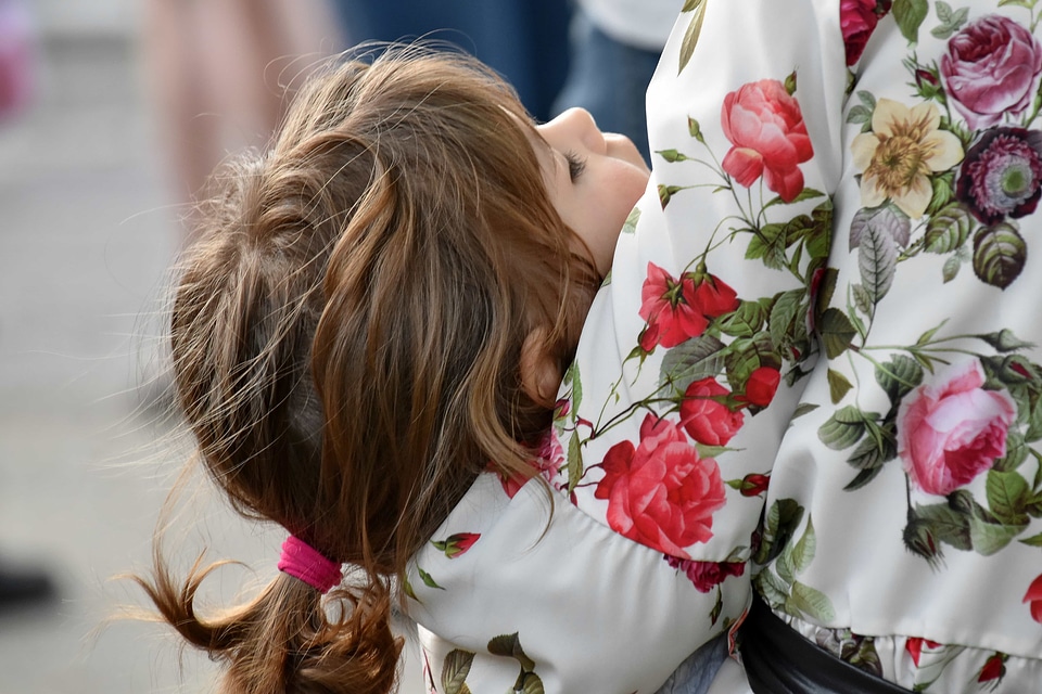 Childhood hugging mother