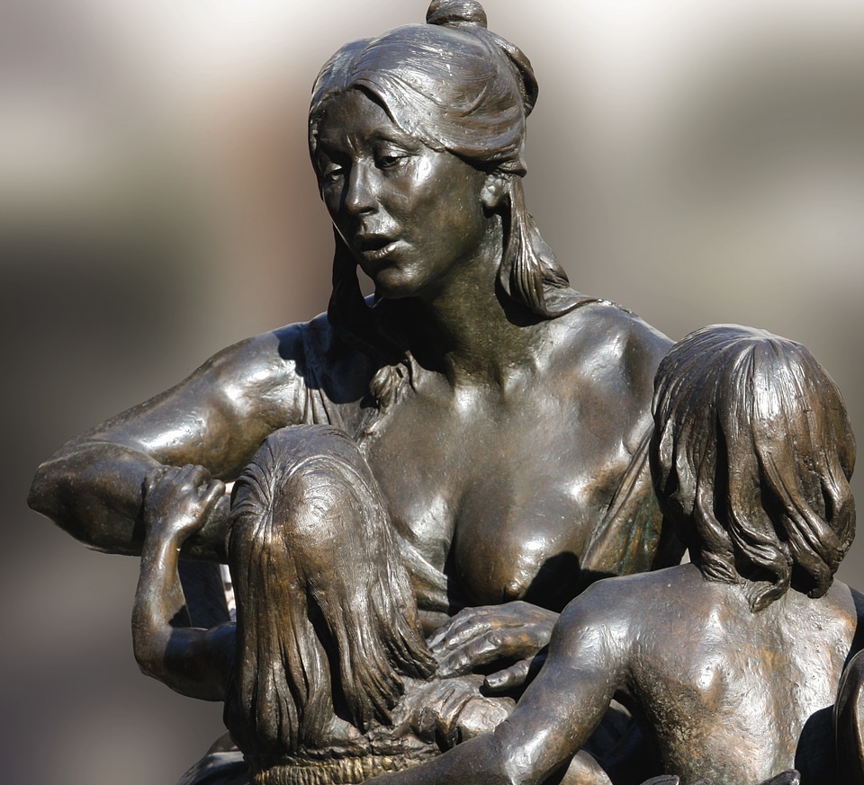 Statue bronze before carousel