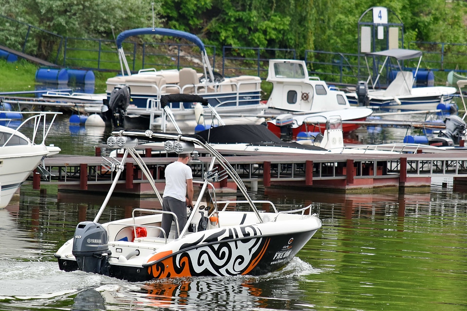Person yacht club yachts