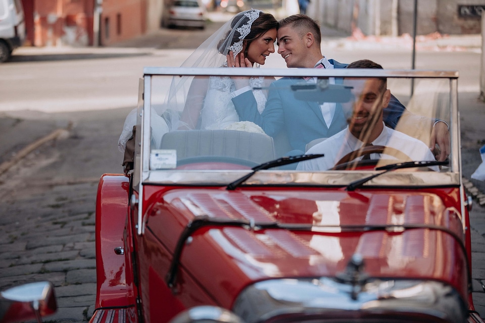 Groom bride kiss