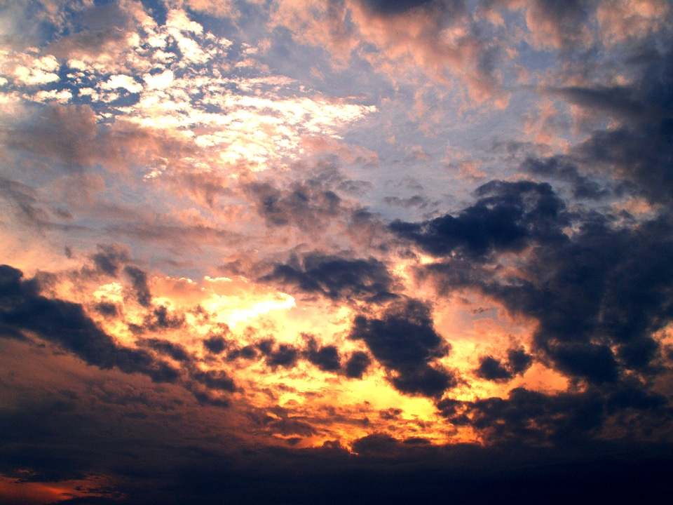 Dark cloudscape sunlight photo