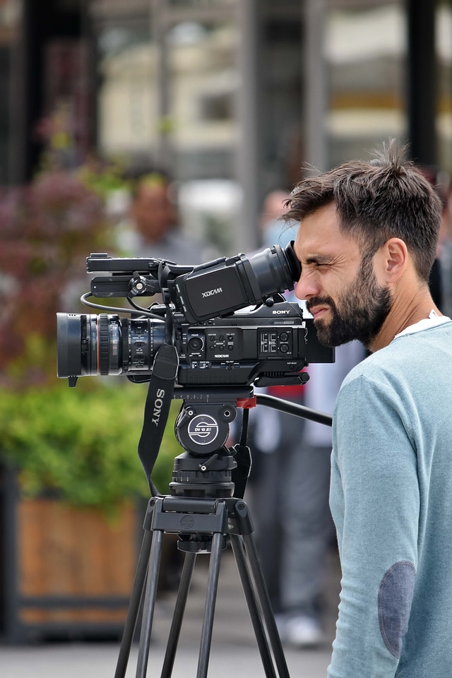 Man beard camcorder