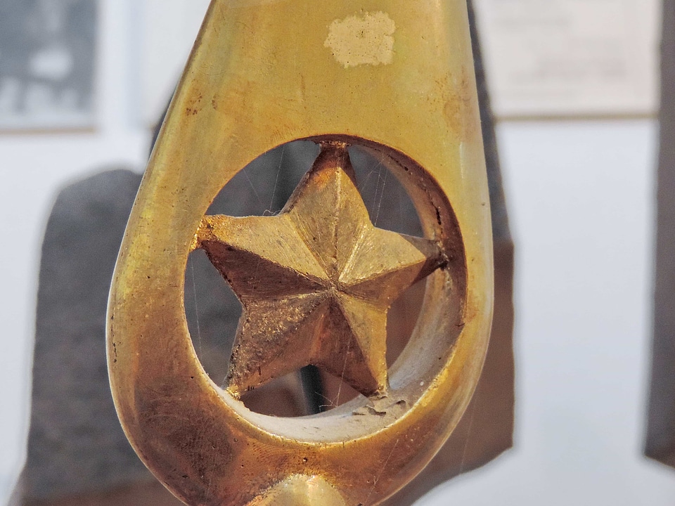Brass detail emblem
