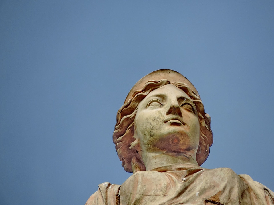 Woman carving sculpture