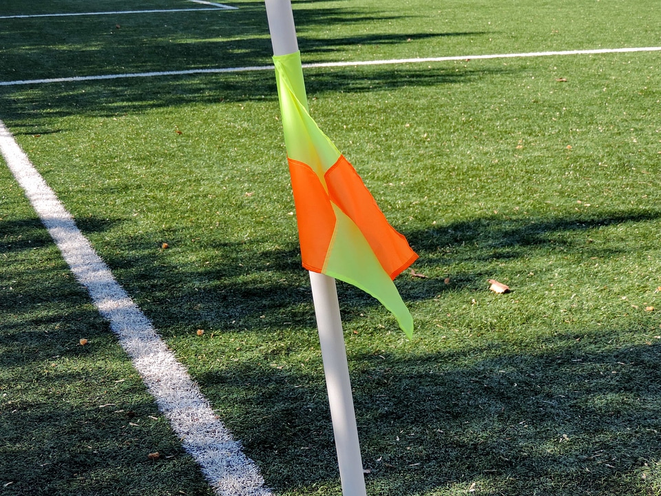 Football Player flag grass