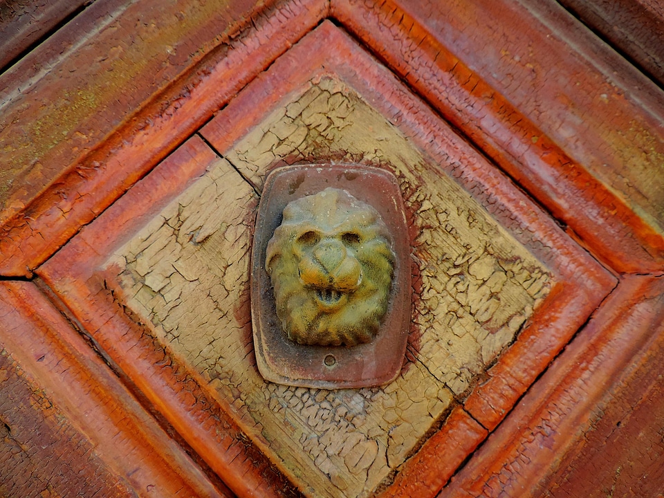 Brass front door sculpture