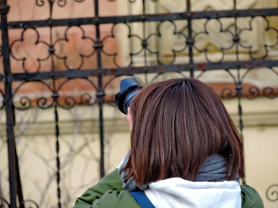 Photographer fence people