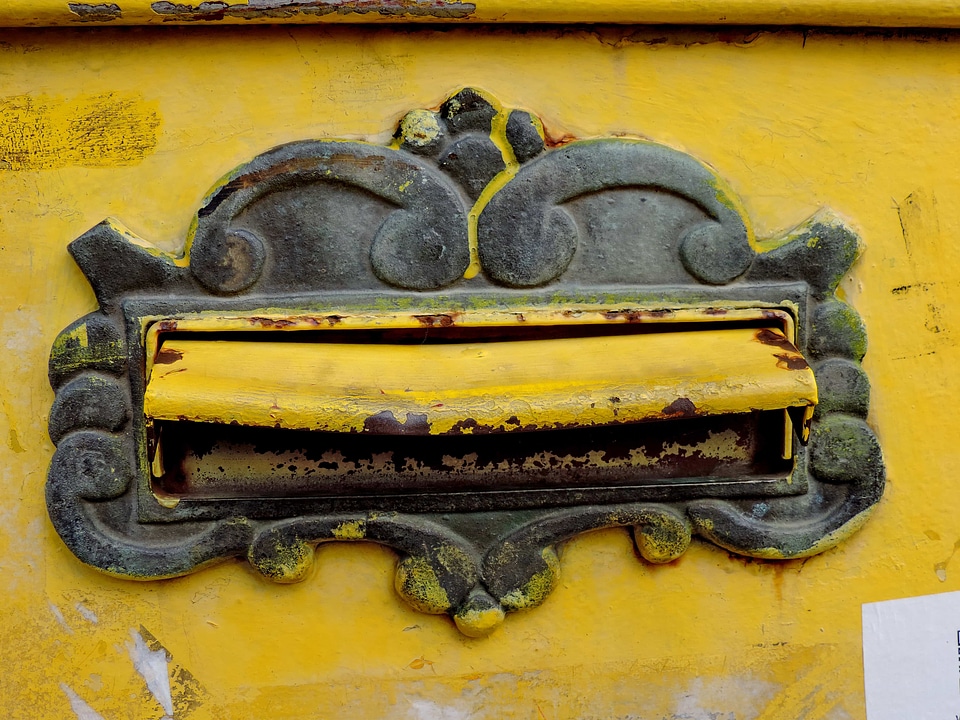 Baroque cast iron mail slot